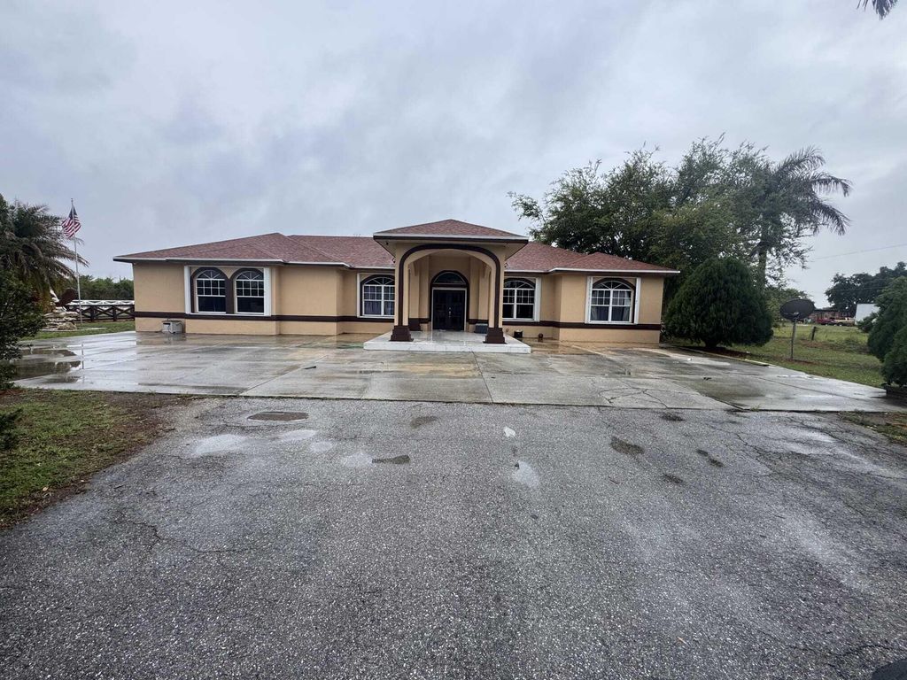 Photo of 435 E A Road E, Labelle, FL 33935 (MLS # B26003647)