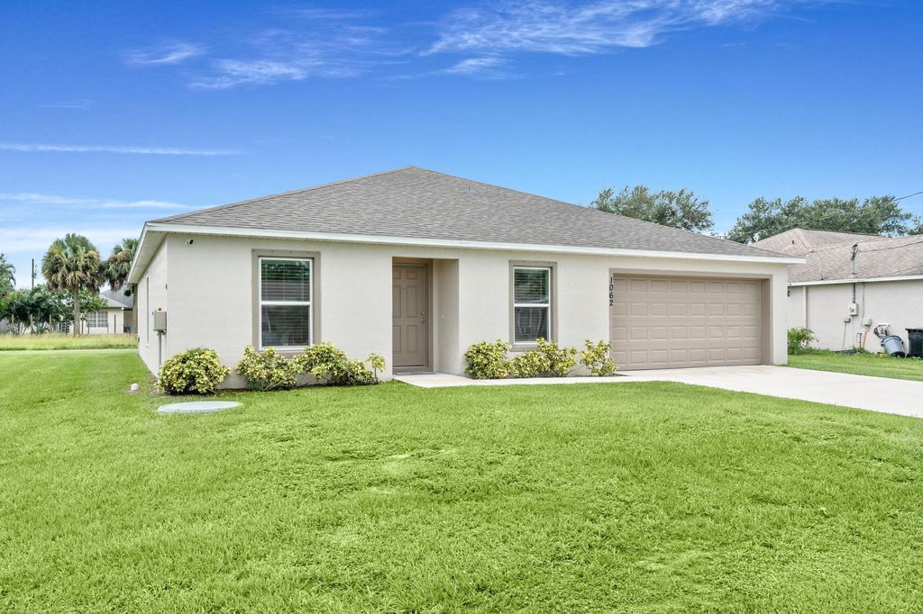 Photo of 1062 SW Sudder Avenue, Port Saint Lucie, FL 34953 (MLS # R11016793)