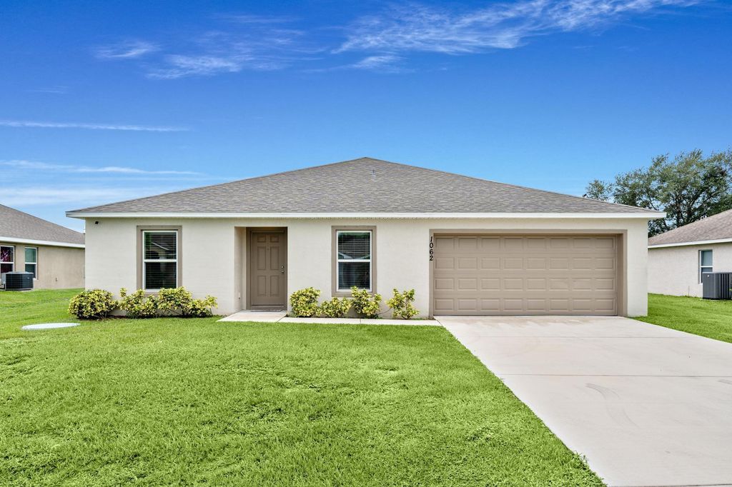 Photo of 1062 SW Sudder Avenue, Port Saint Lucie, FL 34953 (MLS # R11016793)