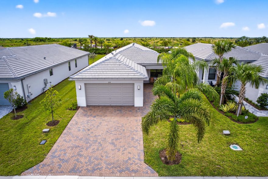 Built in 2024, this Monacello model offers 2 bedrooms, 2.5 bathrooms, den and a 2-car garage in the highly sought-after 55+ Riverland community. This home showcases numerous builder upgrades including tile flooring throughout, pocket doors, 42''kitchen cabinets, upgraded appliances with a gas stove, tankless water heater, and upgraded showers in both the primary and guest baths. The wider paver driveway and walkway add to the home's curb appeal. Additional owner enhancements include custom drapes in the living room, plantation shutters on all windows, and ceiling fans in five rooms. A true turnkey opportunity. Some aspects of the home are ADA friendly. Enjoy all the ameneties Riverland has to offer; Fitness Ctr., Pickelball, Bocce Ball, Tennis, Bball, Arts & Culture Ctr, Dog Park, and mor
