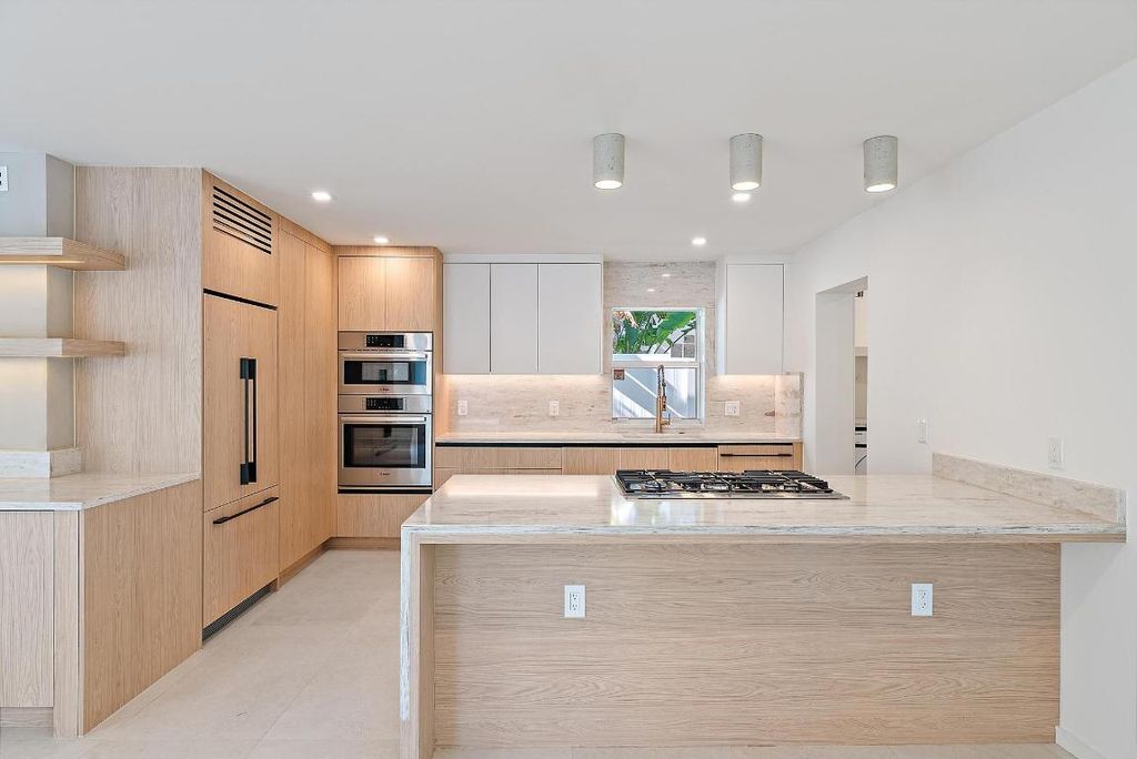 Photo of 107 Sandal Lane #2, Palm Beach Shores, FL 33404 (MLS # R11155705)