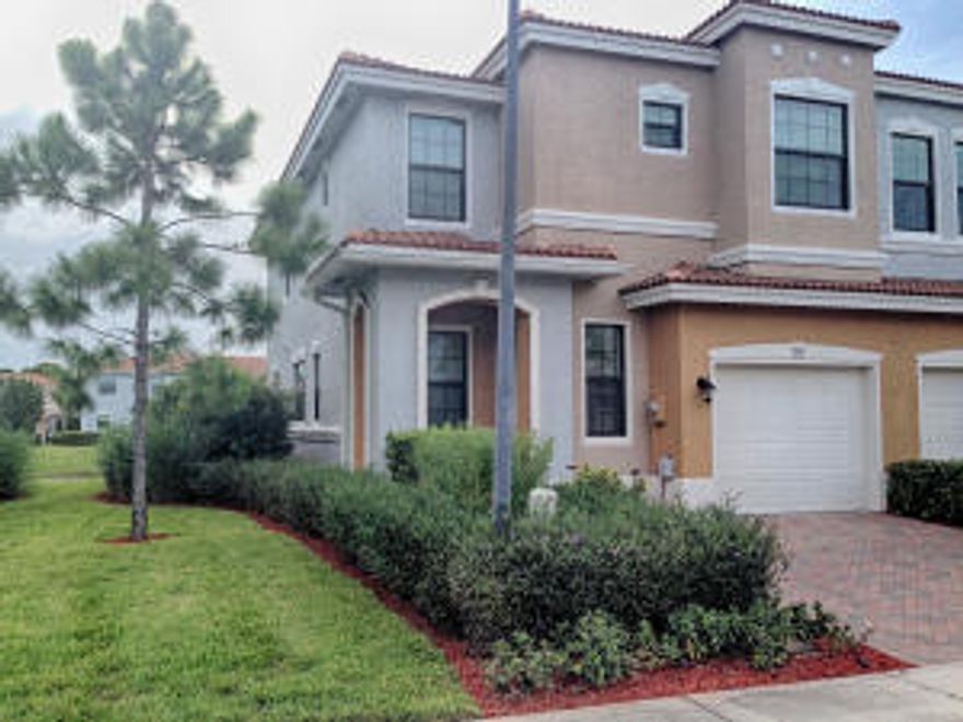 End-Unit townhome with every available upgrade! Gorgeous granite countertops and full backsplash, wine rack, Stainless steel appliances, Hurricane windows no shutters required, raised panel doors with custom hardware. Custom wood blinds throughout. Huge Master suite with walk-in closet. Like-new condition. Beautiful lake view. Pet-friendly community.