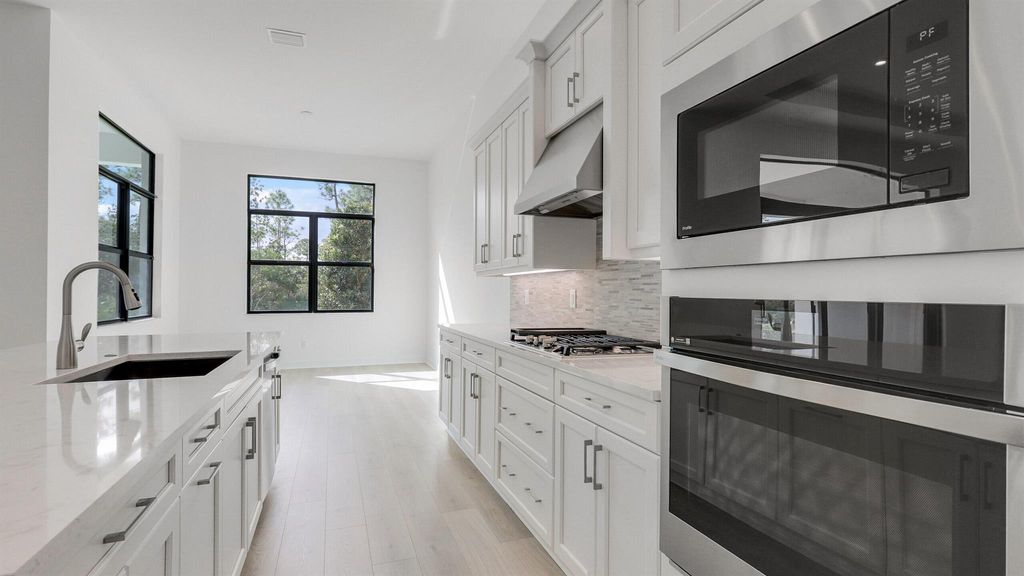 Photo of 2069 SE Mosaic Boulevard, Port Saint Lucie, FL 34984 (MLS # R10938801)