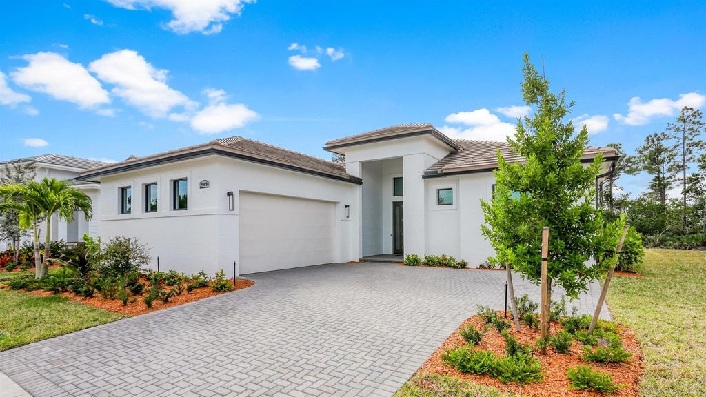 Photo of 2069 SE Mosaic Boulevard, Port Saint Lucie, FL 34984 (MLS # R10938801)