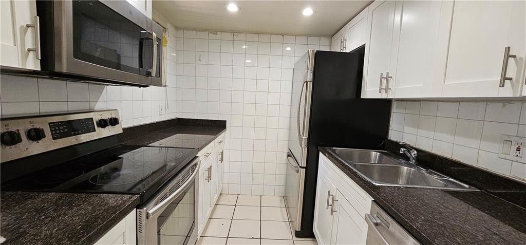 Photo of 4161 NW 114th Terrace, Coral Springs, FL 33065 (MLS # F10511155)