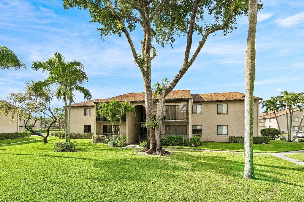 Photo of 535 Shady Pine Way #C1, Greenacres, FL 33415 (MLS # R11154576)