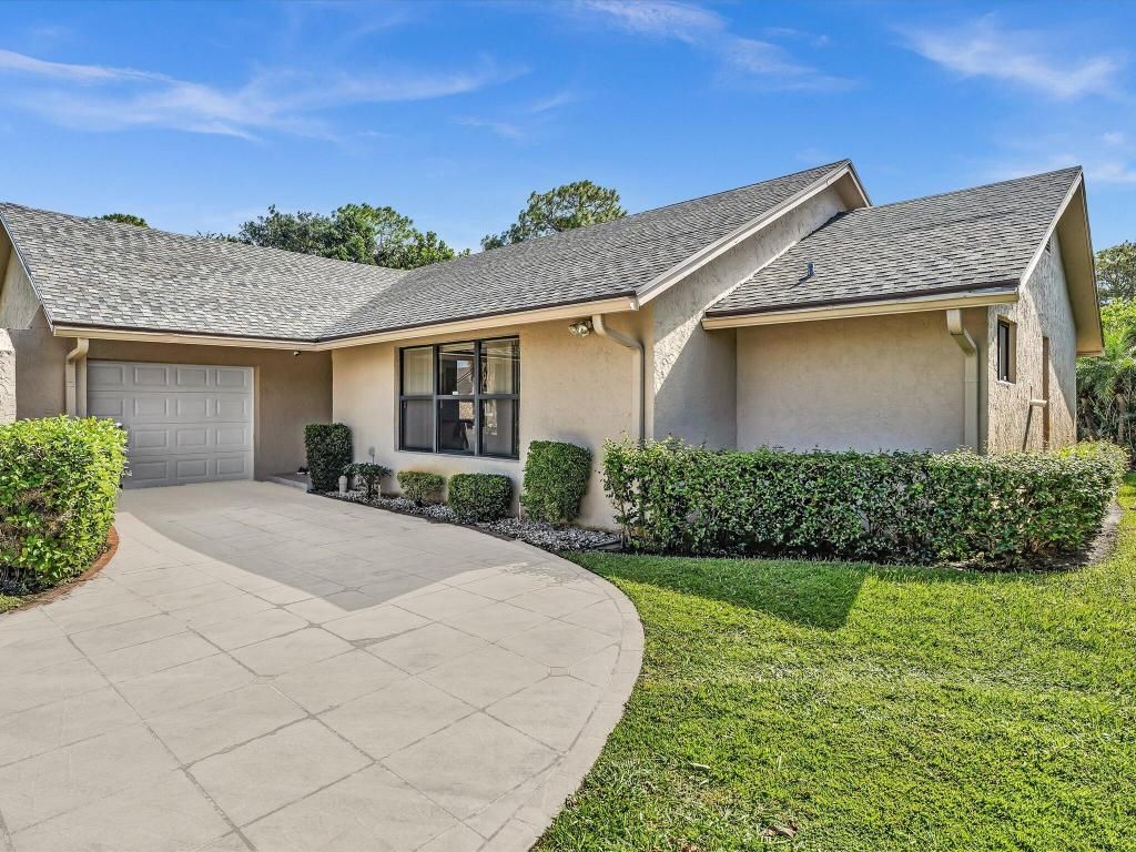 Photo of 8320 E Waccamaw Lane, Lake Worth, FL 33467 (MLS # R11140241)