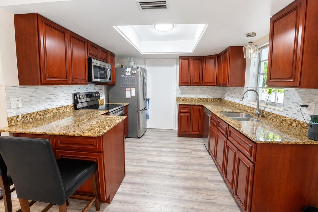 Photo of 5605 WINTER GARDEN Parkway, Fort Pierce, FL 34951 (MLS # B26073160)