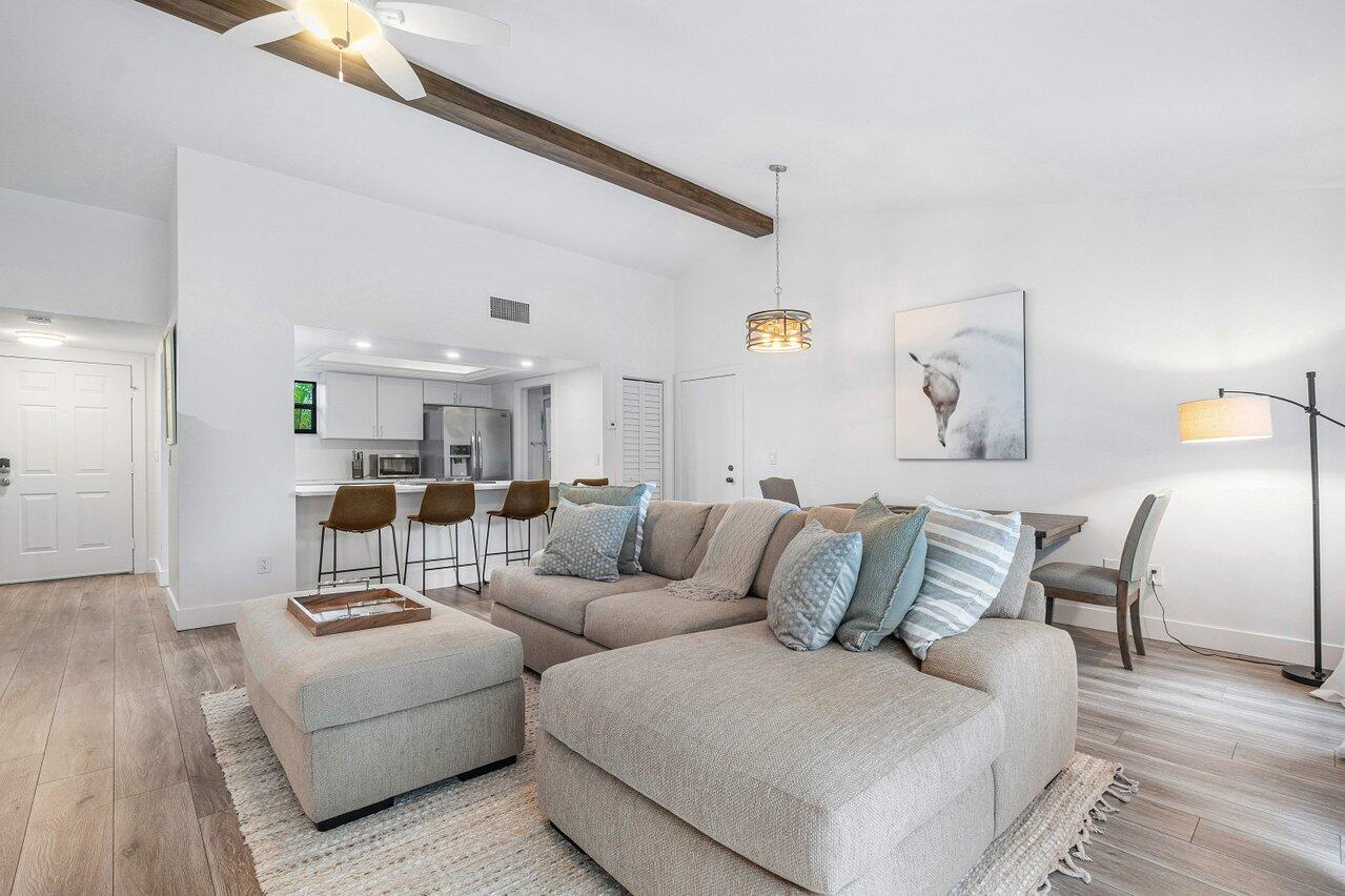 Beautifully refurbished 1 BD/1BA condo with vaulted ceilings and gorgeous light. This unit has everything you need, including a pond view with otters!), and is walking distance to the community pool and restaurants. Located within the gates of prestigious Palm Beach Polo Club FULLY FURNISHED OFF SEASON RENTAL. 13% tax on all leases shorter than 6 months and one day.