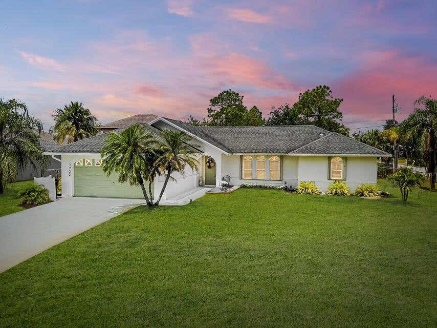 Photo of 1702 SW Commargo Street, Port Saint Lucie, FL 34987 (MLS # R10983704)