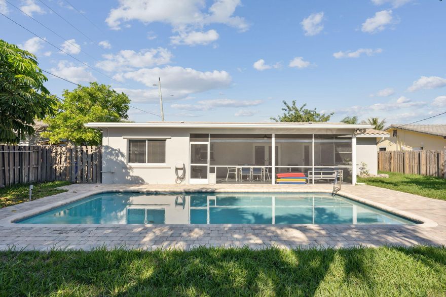 Welcome to this charming single-family home in the heart of Deerfield. This property has 3 bds, 2 bas, and a spacious living area of 1,387+ sq. ft. The interior features an open floor plan with porcelain wood plank tile floors and a modern kitchen that seamlessly merges with the dining and living areas. The main suite stuns with a roomy layout, walk-in closet, and a chic bathroom boasting a tub and spacious shower. The updated cabana bath is perfect for guests. Outside, you'll find a covered patio that overlooks the inground pool & custom lighting. The property sits on a oversized fenced in lot and has a 1-car garage with a wraparound driveway suited for at least 3 cars. This home is within walking distance of the beach, bars, restaurants and conveniently located near Publix & Sprouts.