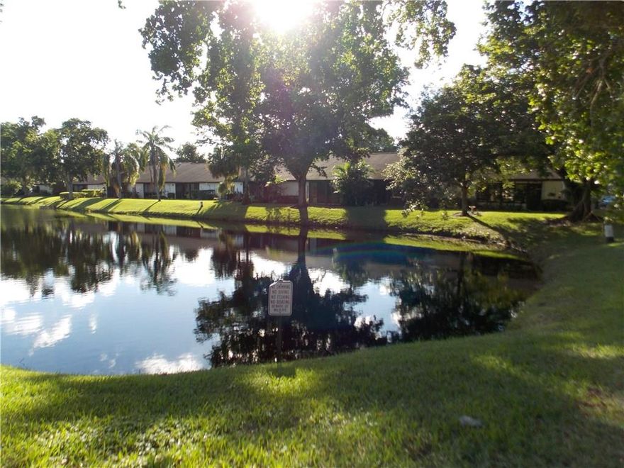 HARD TO FIND WATER FRONT VILLA*BEAUTIFULLY REMODELED KITCHEN WITH STAINLESS STEEL APPLIANCES AND HONEY TONED CABINETS*HIGH QUALITY LAMINATE FLOORS THROUGHOUT*CUSTOM LIGHT FIXTURES & CEILING FANS*HIGH VAULTED CEILINGS IN KITCHEN, LIVING ROOM & DINING ROOM*HUGE WALK IN CLOSET IN MASTER*NEW VANITY IN MASTER BATHROOM W/GRANITE COUNTER*A/C 2005* APPLIANCES 2008*SPACIOUS FLORIDA ROOM/ENCLOSED PATIO*LAMINATE FLOORS & WIDE LAKE VIEW*LARGE STORAGE CLOSET*PRIVATE FRONT COURTYD PATIO*SMALL PET OK*SORRY NO RENTALS*