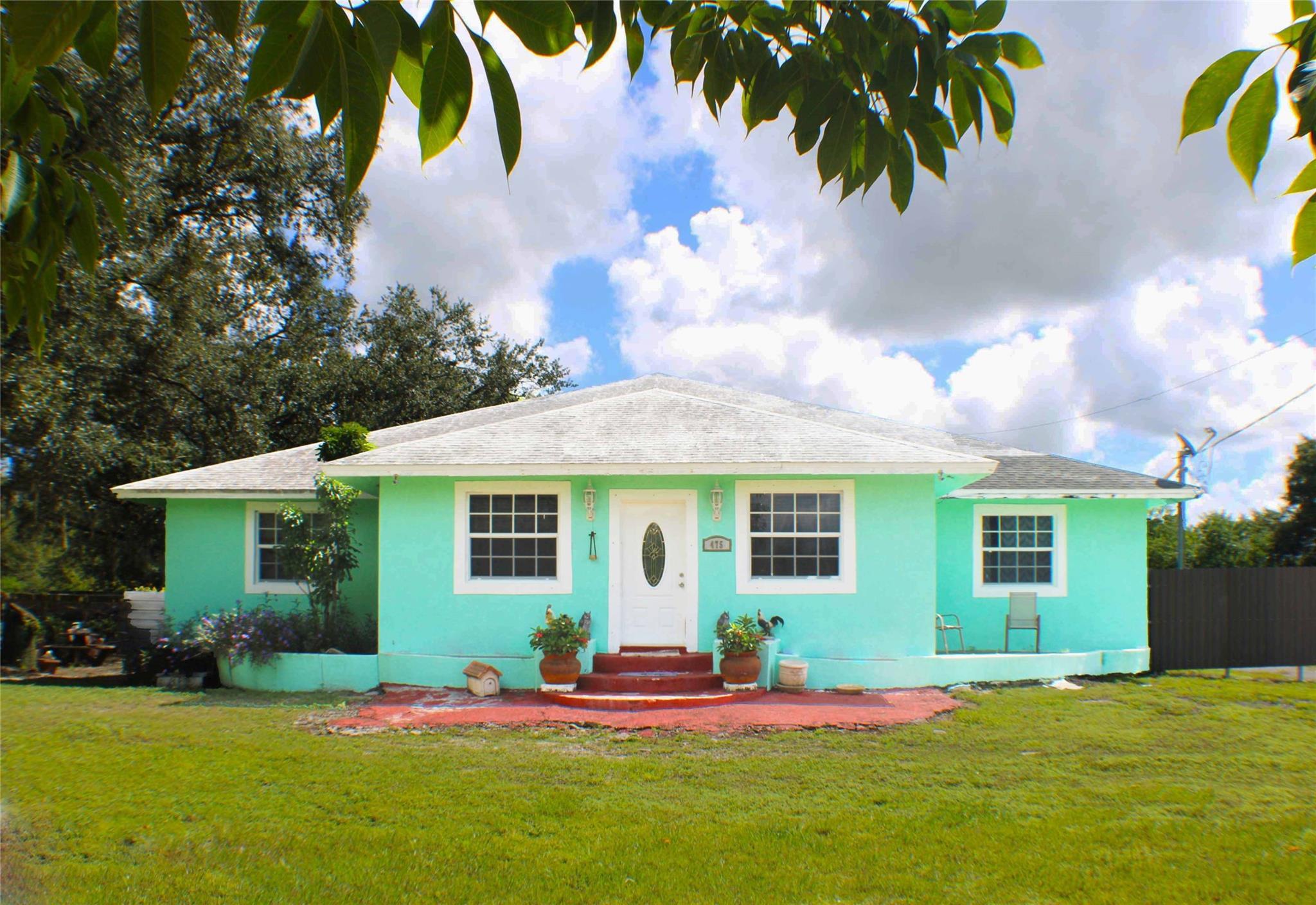 Spacious and fully renoved property, Offering 3,284 sqft. of living area on a 1.09-acre lot in Montura Ranch. This unique property features five bedrooms and two bathrooms, along with two independent living spaces ideal for extended family or rental opportunities. 
The efficiency unit, with its own private side entrance, includes a living room, bedroom, and full bathroom. On the opposite wing, a guest house also provides an independent entrance. The main home boasts an expansive central area with a large living room, dining area, and a spacious kitchen designed for comfortable gatherings. The central wing includes a master bedroom, two additional bedrooms, and a full bathroom, offering both privacy and functionality.