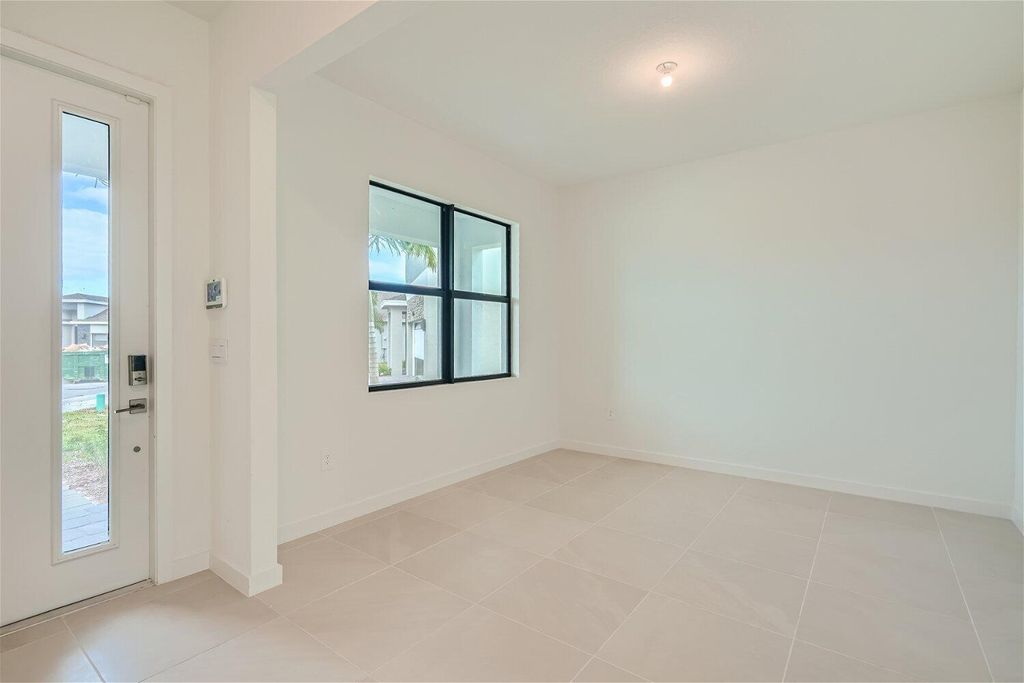 Photo of 2127 NE Cedar Street, Jensen Beach, FL 34957 (MLS # R11000140)