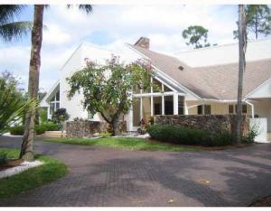 MUST SEE TO BELIEVE!, Exclusive Private Estate in Thousand Pines. This grand 4 or 5 bedroom, 4.3 bath residence sits on over an acre of lushly landscaped yard with garage, pool and tennis court. A circular drive leads to an elevated entrance with double doors to two story foyer opening to massive living room with stone fireplace wall, wet bar and glass doors leading to an expansive screened lanai, pool and custom fire pit oven, all adjacent to a lovely tennis court! Unbelievable custom kitchen with wood cabinets, Brazilian Muscarella counter tops, new Wolf ovens and glass breakfast room. Among the features are the salt water pool, whole house alarm, UV tinted windows with outer aluminum wrap, newer roof, newer washer and dryer in large laundry/prep room