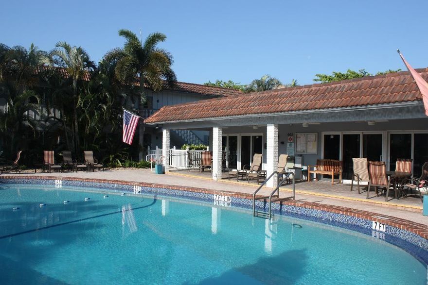 Possible Owner financing with 25% down. Minimum credit score of 650. Fantastic upscale unit. Completely remodeled. All permits in place. Washer and Dryer in unit. All stainless appliances. Tiled floors throughout. Spotless condition. Impact windows. Beautiful cabinets and countertops. Like new condition. Quiet, secure complex. Very well maintained. Tropical Courtyard with heated pool and Clubhouse. 55 and older community that does allow 25% of residents to be under 55. Pet friendly. 1 pet per unit. Up to 20 lbs. max. Refreshed hallways with new lighting and carpeting.  Parking very close by the unit. 20% down required. 50 Year inspection completed. No assessment planned. Great financial stability. Great if your a snowbird. Just lock the door and don't worry.