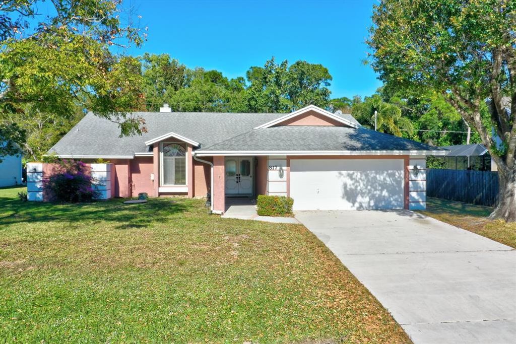 Photo of 817 SE Streamlet Avenue, Port Saint Lucie, FL 34983 (MLS # R10770261)