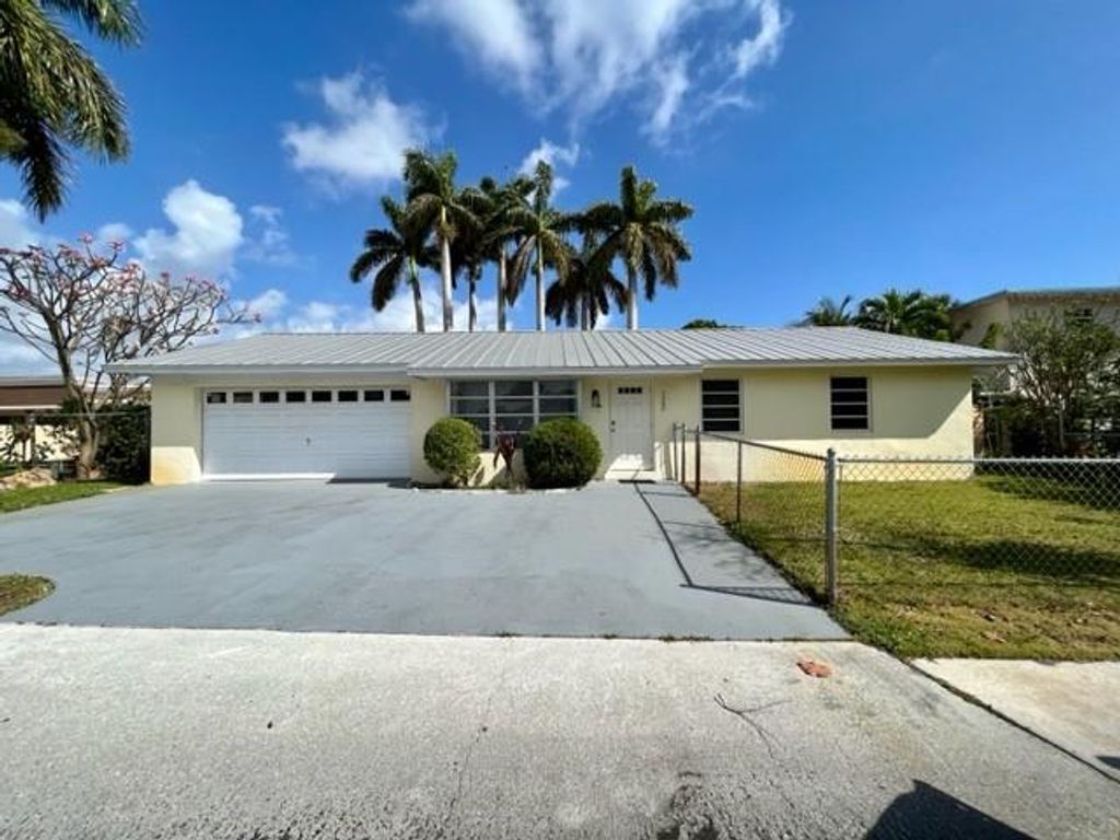 Photo of 122 E 30th St, Riviera Beach, FL 33404 (MLS # F10374969)
