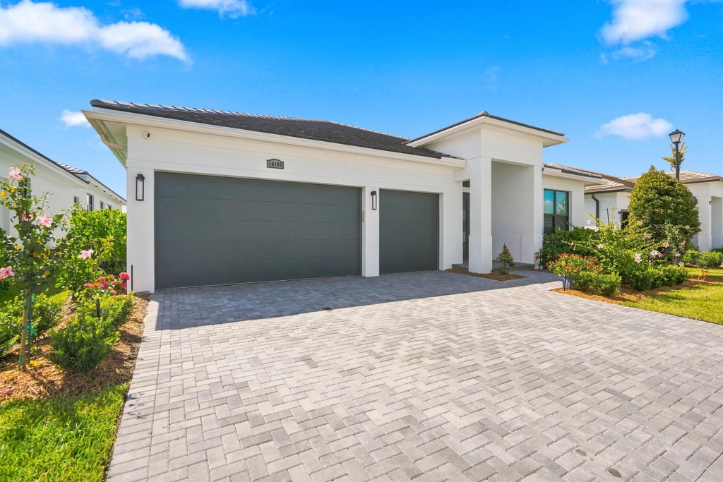 Photo of 10105 SW Latium Way, Port Saint Lucie, FL 34987 (MLS # B26071724)