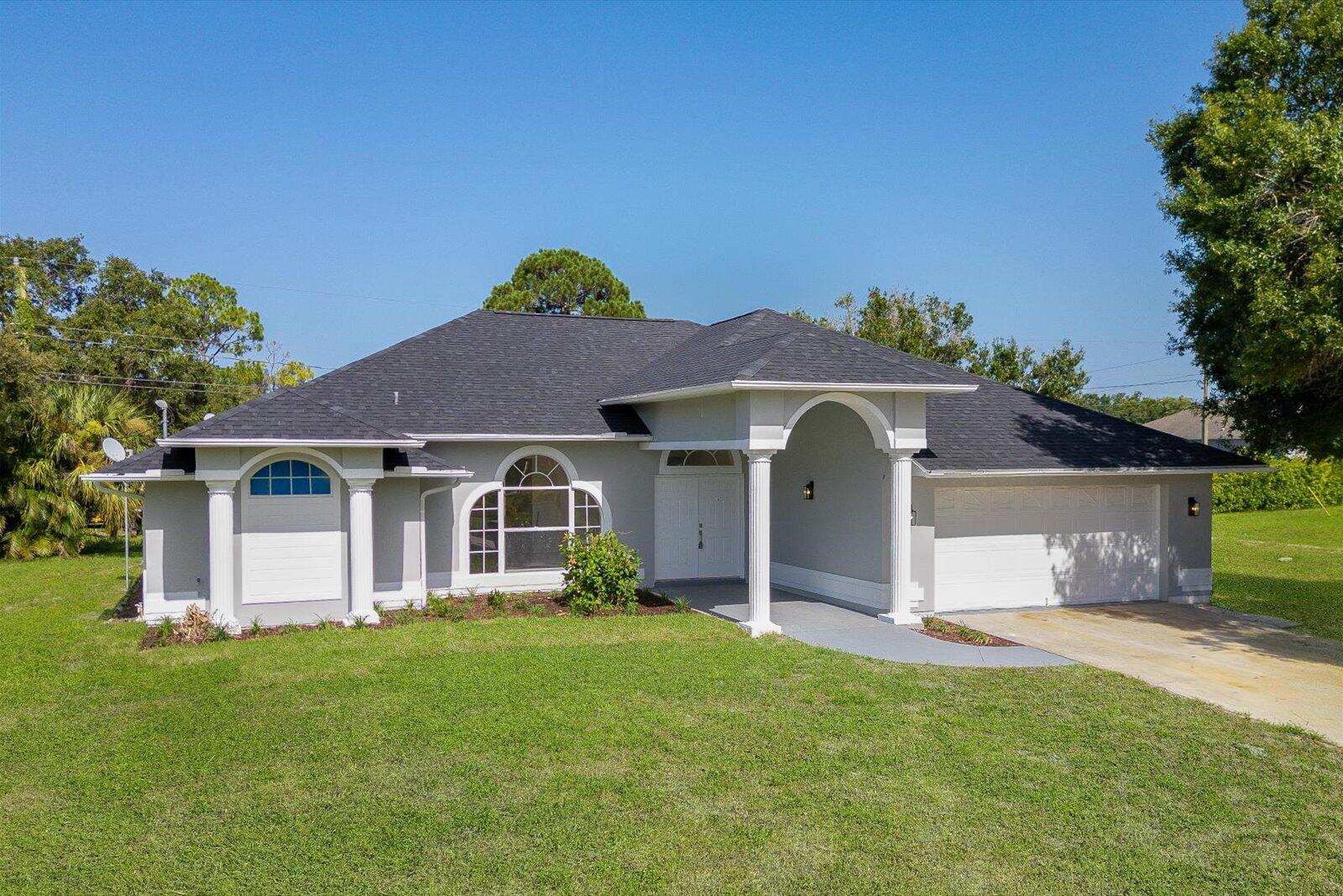 Showings must be scheduled with Showingtime or Sentri. Stunning 3/2 home remodeled in 2025 with gorgeous kitchen and bathrooms! Minutes from town and beaches. Completely move in ready. Offering new Calacatta quartz kitchen with soft close shaker cabinets and high end finishes, spa like tile bathroom with high end vanity, waterproof laminate floors, fresh paint in and out, Brand new appliances, new fixtures and landscaping. Easy access to i95 and shopping. Move in ready condition, you wont need to lift a finger. No HOA!! Come relax in this gorgeous home and live your Florida Dream!