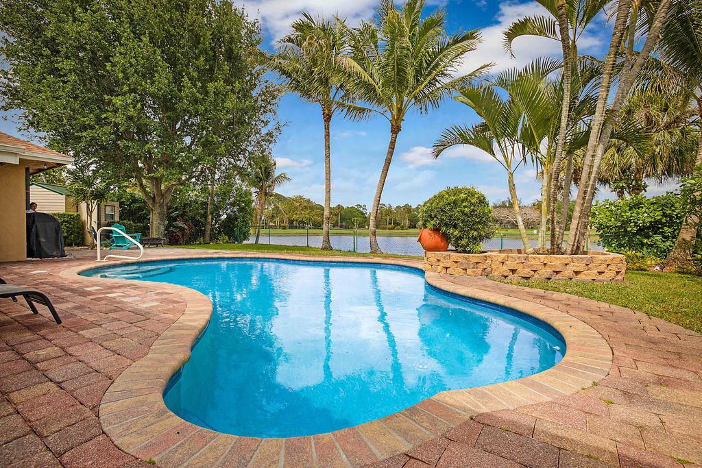 Photo of 8272 Blue Cypress Drive, Lake Worth, FL 33467 (MLS # B26020062)