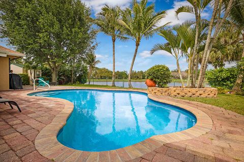 Photo of 8272 Blue Cypress Drive, Lake Worth, FL 33467 (MLS # B26020062)