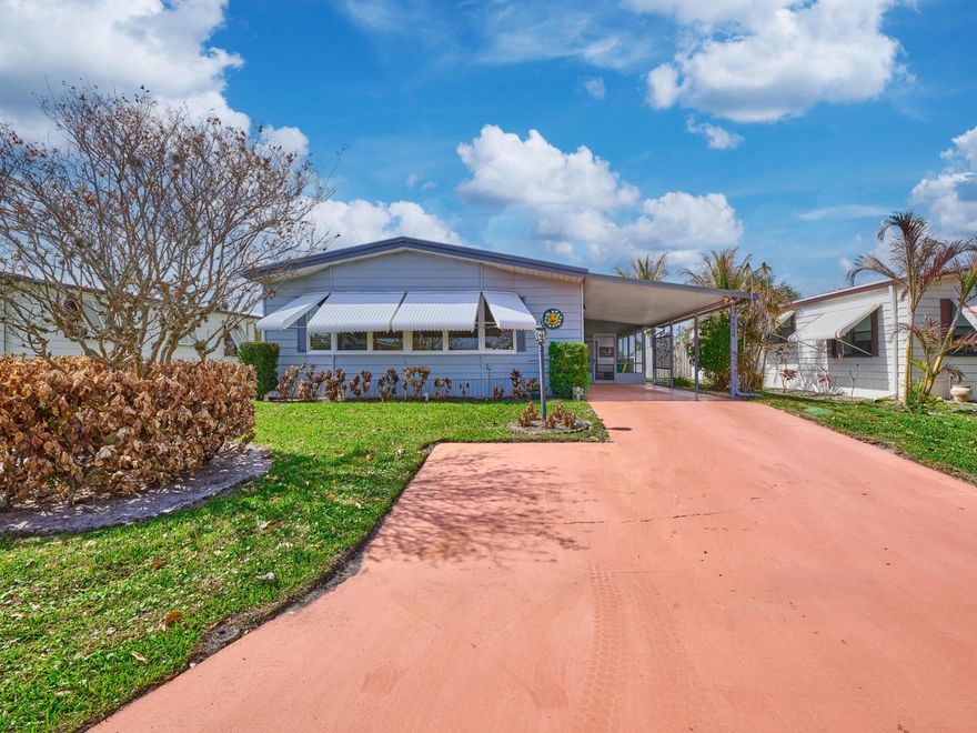 Much sought after Prestige Model Manufactured Home in Cambridge, 55+ community in Hobe Sound.  2 Bedrm/2 Bath + Family Room - Wide Open Feel!! Large sun filled LR flows easily into the open Kitchen w center cook island & Family Room w Wet Bar. The Master Bedrm is large & light & Bright w ensuite bathrm w step in shower, soaking tub, dual sinks & walk in closet. The 2nd Bedrm is a good size also w ensuite bath. The home also has a convenient office nook. Thru a slider you enter a large screen room w a Shed/Laundry/storage room. So many areas in the home to enjoy & perfect for entertaining friends & family. Membrane roof 2016, A/C 2020,  Fridge 2025, washer 2019, Dryer 2023.  Cambridge is an active community w Clubhouse, heated pool, gym, shuffleboard etc. YOU OWN THE LAND - ALL  PETS OK.