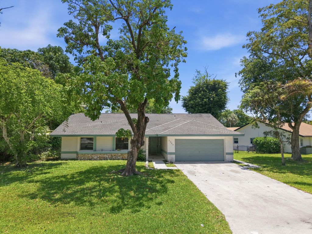 Photo of 2260 NW 40th Terrace, Coconut Creek, FL 33066 (MLS # B26026280)