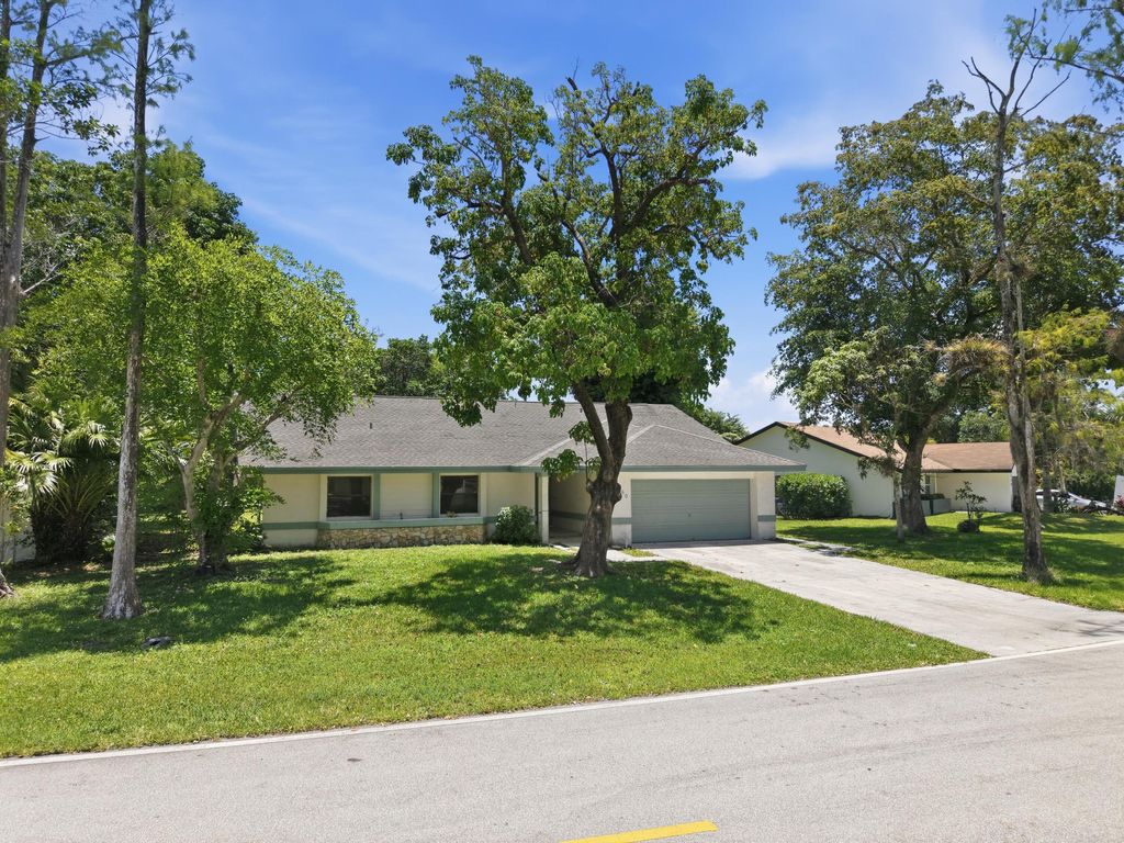 Photo of 2260 NW 40th Terrace, Coconut Creek, FL 33066 (MLS # B26026280)