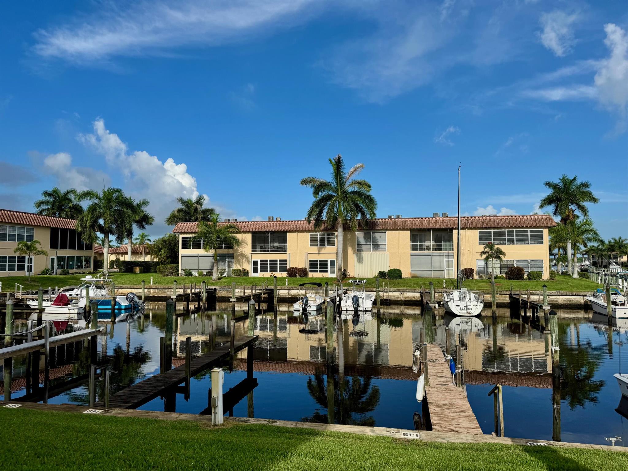 Waterfront Condo with Dock & Boat Slip - De La Bahia 55+ CommunityEnjoy waterfront living at its finest in this beautifully maintained 2-bedroom, 2-bath corner unit located on the 2nd floor with direct water views-a boater's dream! Step into a bright and open layout w/ tile and carpet flooring, fresh paint accordion shutters, and a newer washer & dryer for your convenience.The updated master bath adds a modern touch, while the large enclosed balcony offers the perfect spot to relax and take in stunning views of the water. Whether you're sipping morning coffee or watching the sunset, this space is sure to be your favorite retreat.Residents enjoy a vibrant lifestyle with close proximity to downtown, beaches, shopping, and dining. This is the ideal spot for seasonal or year-rou