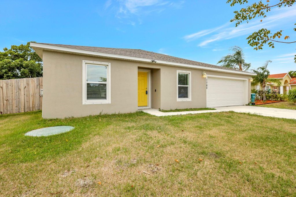 Photo of 1782 SE Ridgewood Street, Port Saint Lucie, FL 34952 (MLS # R10976769)