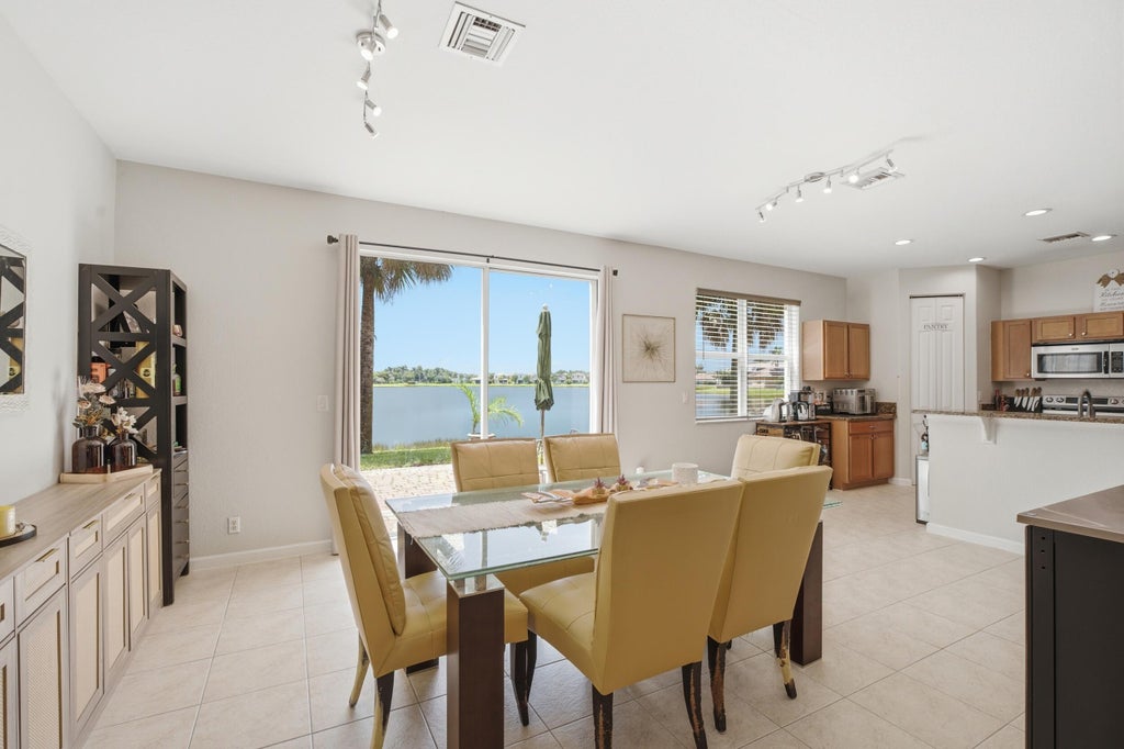 Photo of 991 NW Leonardo Circle, Port Saint Lucie, FL 34986 (MLS # B26070095)