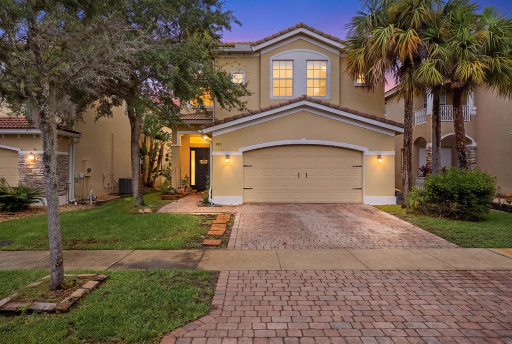 Photo of 991 NW Leonardo Circle, Port Saint Lucie, FL 34986 (MLS # B26070095)