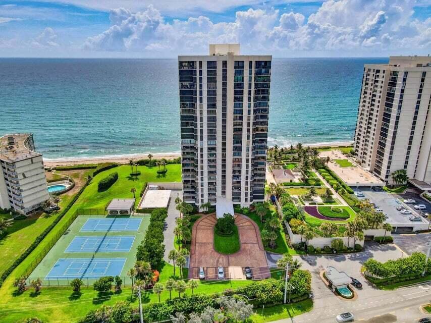 Forever direct Ocean and Intracoastal views from every room of this recently renovated 3 bedroom /3.5 bath unit located directly on the sand in Eastpointe II. This unit lives like a single-family home in the sky with over 2,614 living square feet and a total of 3,061 square feet. The gourmet kitchen was opened to the great room and was designed with an extra-large quartz island countertop and is the perfect spot to entertain your family and friends. Cooking is a breeze with your top-of-the-line Viking appliances including a double oven with warming drawer, wine cooler and a reverse osmosis water filtration system. No carpet here, 16x16 porcelain tile throughout and all the bathrooms have been updated. With its split floor and three