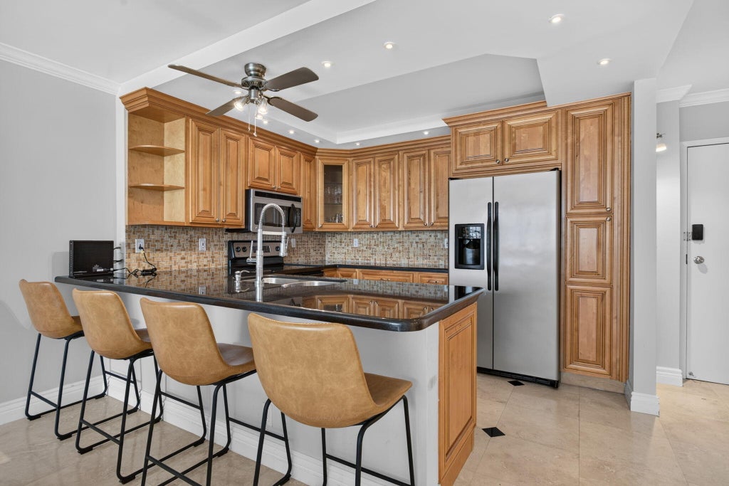 Photo of 800 SE 20TH Avenue #811, Deerfield Beach, FL 33441 (MLS # B26074631)