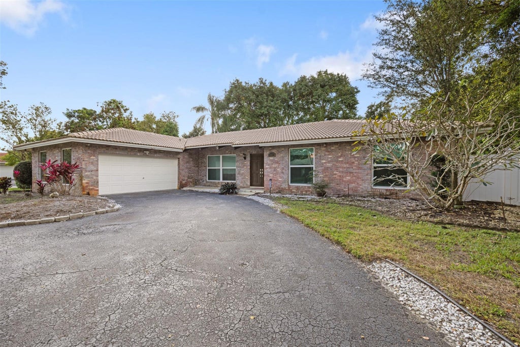 Photo of 9902 NW 20th Street, Coral Springs, FL 33071 (MLS # F10549830)