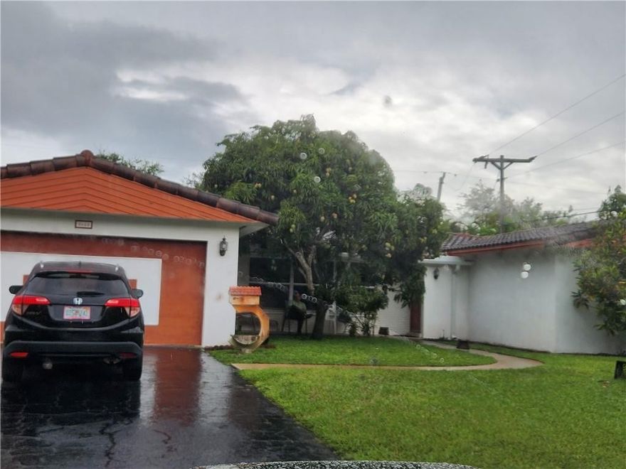 THE OPPORUNITY IS HERE FOR YOU TO OWN THIS SPACIOUS MID CENTURY RANCH HOME IN THE HEART OF PLANTATION ON MASSIVE YARD WITH PRIVATE SCREENED POOL!  SPLIT BEDROOM LAYOUT WITH SPACIOUS BEDROOM SIZES (NO COOKIE CUTTER ROOMS HERE)!  KITCHEN HAS BEEN UPDATED WITH NEWER STYLE CABINETRY AND GRANITE COUNTERS.  OPEN LIVING ROOM WITH WORKING CORAL WRAPPED FIREPLACE.  FRONT LIVING ROOM AND 2 BEDROOMS HAVE IMPACT GLASS AND BACK SLIDERS HAVE HEAVY GUAGE PANELS.  HOME WILL NEED YOUR LOVING CARE BUT WITH OVER 2000 SF, WHAT ELSE CAN YOU ASK.  GARAGE WAS CONVERTED TO LARGE GAMEROOM (SHOWS IN BCPA AS SQUARE FOOTAGE) AND CAN BE RETURNED.  SCREENED IN POOL WITH PLENTY OF PATIO SPACE.  BOTH INTERIOR AND OUTSIDE ELECTRICAL BOX REPLACED.  UNKNOWN AGE OF ROOF. Seller DisclosureLead Based Paint Disclosure