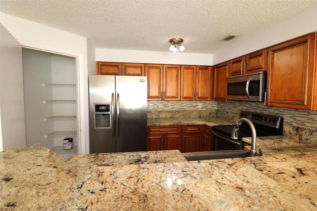 Photo of 2445 SW 18th Ter #907, Fort Lauderdale, FL 33315 (MLS # F10509736)