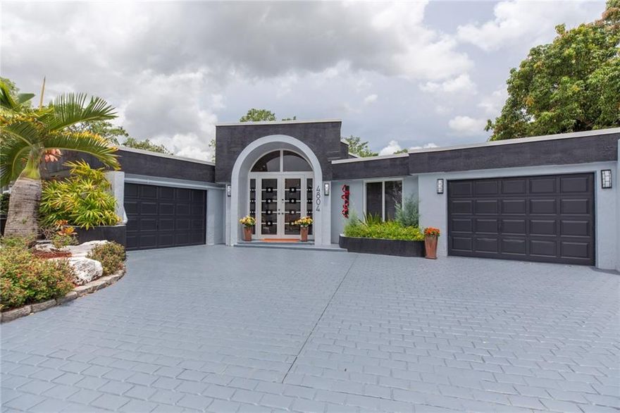 Stunning home with high ceilings (14'), open floor plan and expansive golf course views. BRAND NEW COOL ROOF, HURRICANE WINDOWS AND DOORS! Oversized master suite with 2 updated bathrooms plus 2 huge walk-in closets. 5-panel frosted glass interior doors. Newer AC units. Screened in pebble tech pool. New kitchen w/ 48" wide refrigerator, quartz counters, Bosch dishwasher and much more. Just minutes away from fine dining, Sawgrass Mills mall or the beach. Move in ready, a must see!