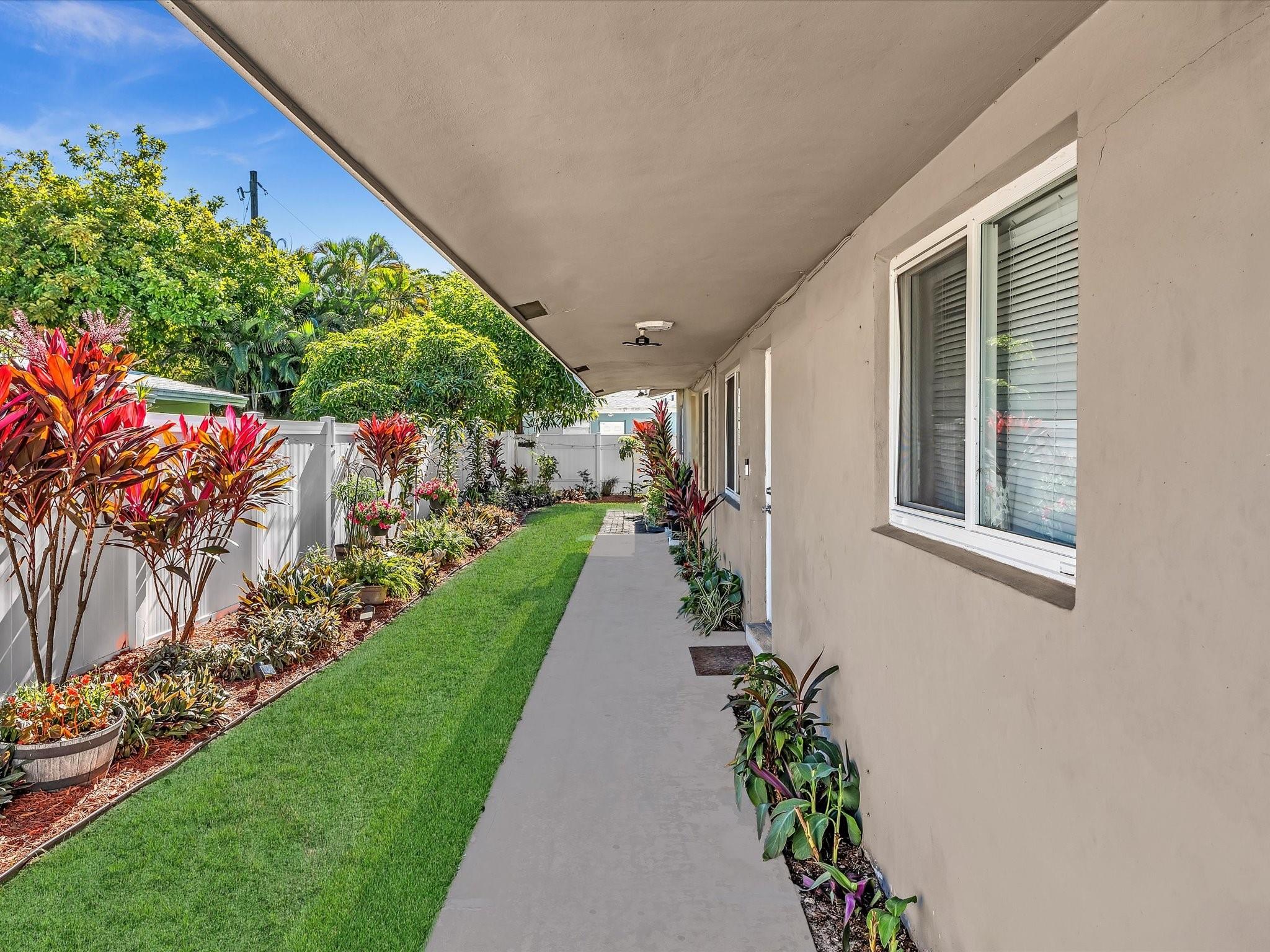 BRAND NEW EVERYTHING! Rent this unit located this Lush Residential neighborhood in Wilton Manors. This spacious two bedroom, one bath apartment is one half of a Duplex which is Completely Remodled. The entire unit has brand new wood grain tile flooring throughout. The open concept Kitchen has all stainless steel appliances and faces the living and dining area. One large bedroom faces the fully enclosed concrete tile patio. The other large bedroom faces the garden and driveway with large windows bringing in lots of Natural Light. This unit comes with two parking spaces and tenants must park in tandem if they have two vehicles. The third row of the driveway is reserved for visitors. Want that Feeling of Living in a Single Family Home? Come and See this one for Sure!