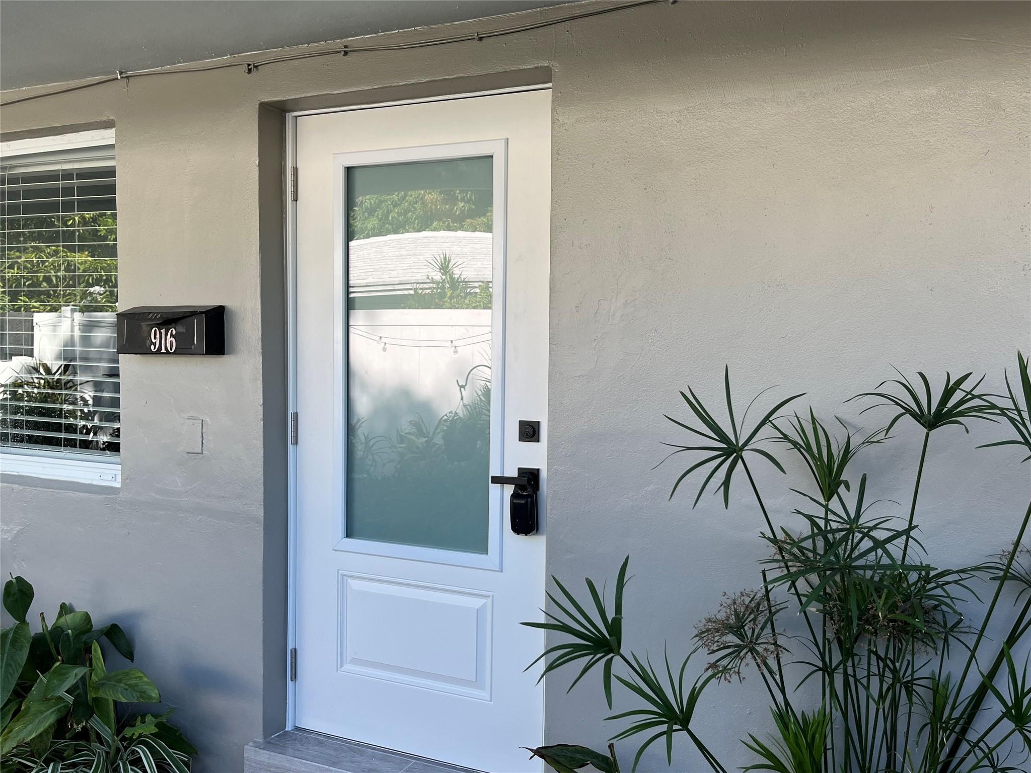 BRAND NEW EVERYTHING! Rent this unit located  this Lush Residential neighborhood in Wilton Manors. This spacious two bedroom, one bath apartment is one half of a Duplex which is Completely Remodled. The entire unit has brand new wood grain tile flooring throughout. The open concept Kitchen has all stainless steel appliances and faces the living and dining area. One large bedroom faces the fully enclosed concrete tile patio. The other large bedroom faces the garden and driveway with large windows bringing in lots of Natural Light. This unit comes with two parking spaces and tenants must park in tandem if they have two vehicles.  The third row of the driveway is reserved for visitors. Want that Feeling of Living in a Single Family Home? Come and See this one for Sure!