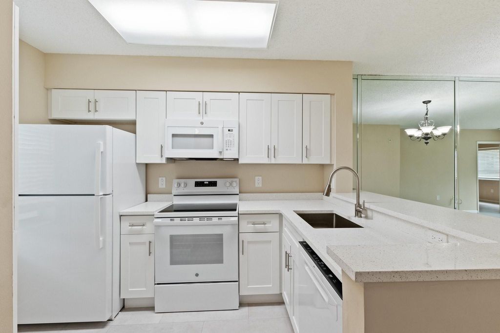 Photo of 2236 N Cypress Bend Drive #112, Pompano Beach, FL 33069 (MLS # F10499346)