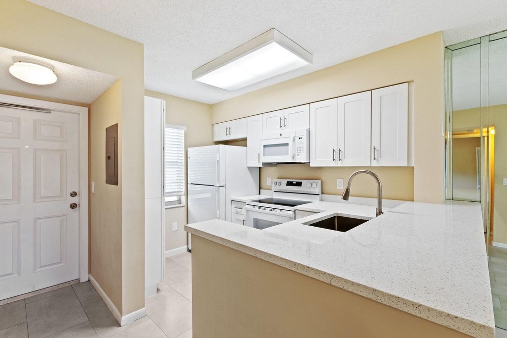 Photo of 2236 N Cypress Bend Drive #112, Pompano Beach, FL 33069 (MLS # F10499346)