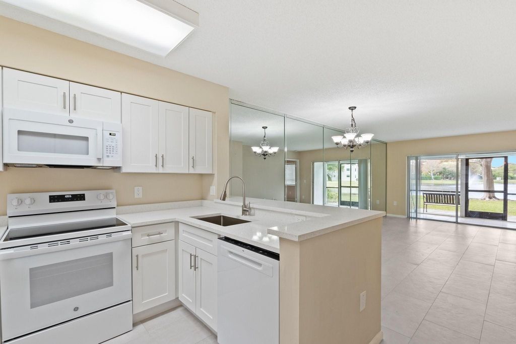 Photo of 2236 N Cypress Bend Drive #112, Pompano Beach, FL 33069 (MLS # F10499346)