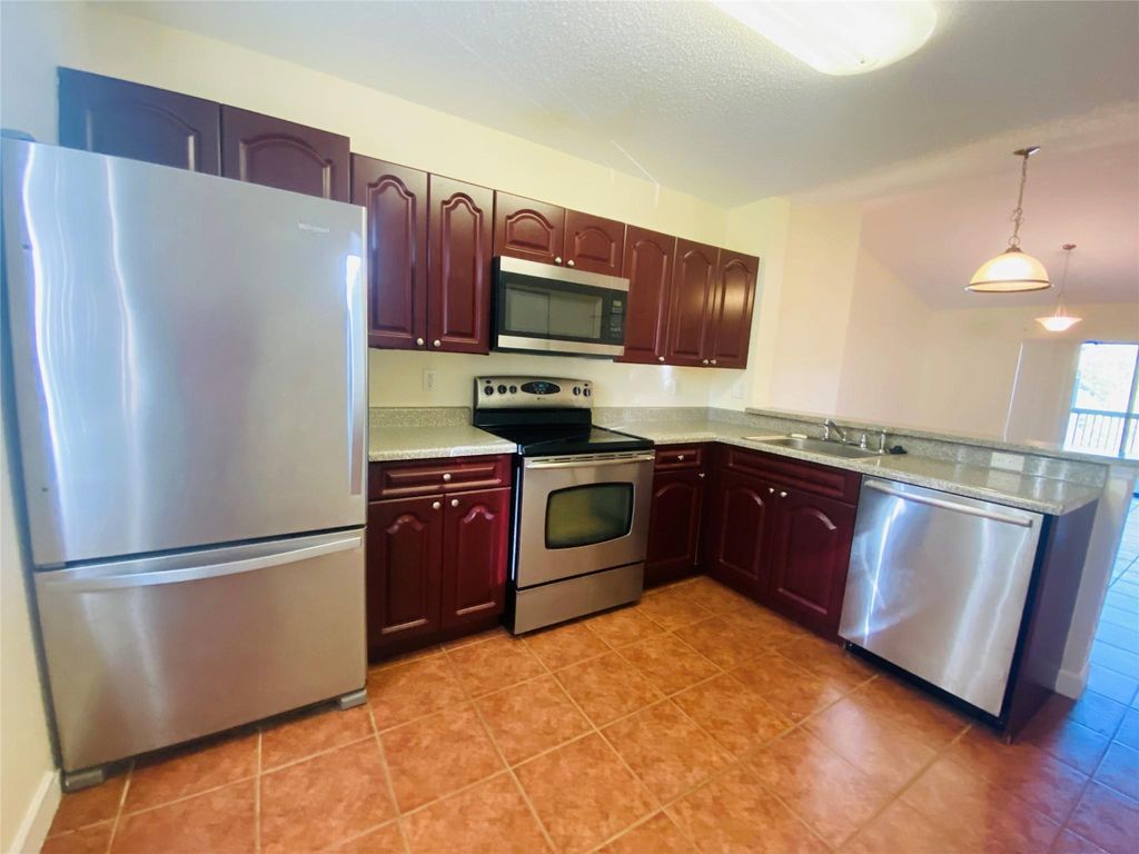 Photo of 5721 Riverside Drive #306B, Pompano Beach, FL 33067 (MLS # F10488225)