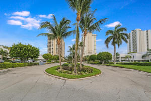 GORGEOUS, ACTIVE 55+ COMMUNITY . PERFECT SIZE AND LOCATION! PRICE TO SELL AND READY TI MOVE IN, SEASONAL OR RENTAL. RARE END UNIT WITH LOTS OF WINDOWS. PRIVATE WITH GARDEN VIEW. BEAUTIFULLY DECORATED, HURRICANE SHUTTERS. DEVELOPMENT IS ON THE WATER AND IT IS LOCATED ACROSS FROM THE BEACH. COMMUNITY OFFERS OLYMPIC SIZE HEATED POOL, TENNIS COURTS, CLUBHOUSE, BBQ GRILLS, SAUNA, SHUFFLEBOARD, BOAT SLIPS POSSIBLY FOR SALE OR RENT. IT IS REALLY A PIECE OF PARADISE!!! DO NOT MISS THIS ONE !!!