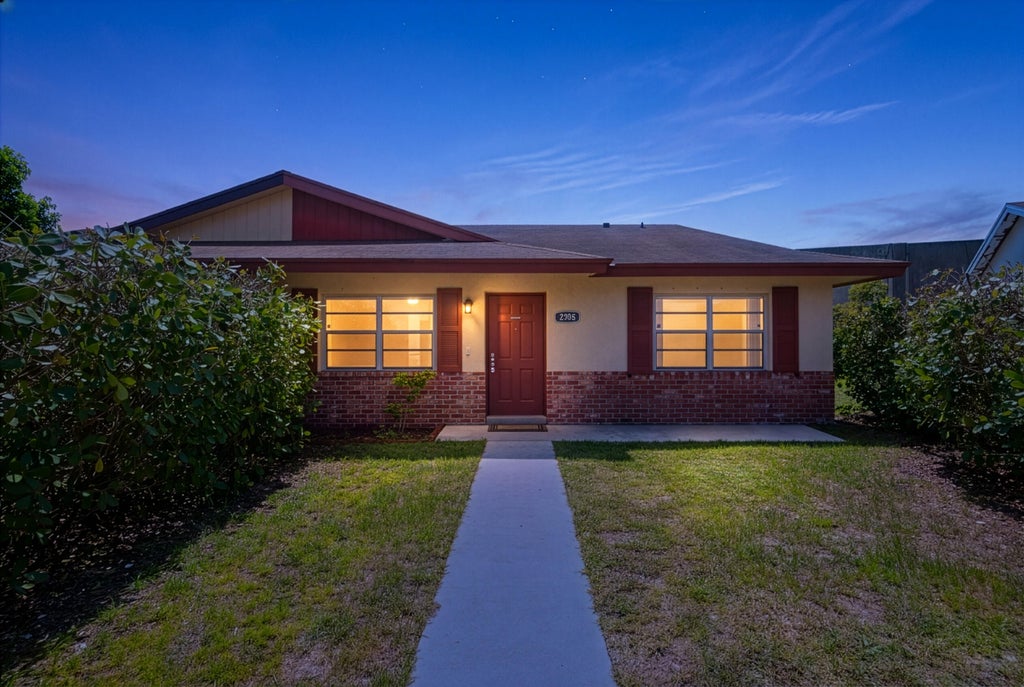 Photo of 3958 CHAPEL Street, Palm Beach Gardens, FL 33403 (MLS # B26056317)
