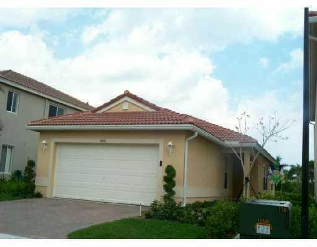 Photo of 1009 Big Torch Street, Riviera Beach, FL 33407 (MLS # R10953107)