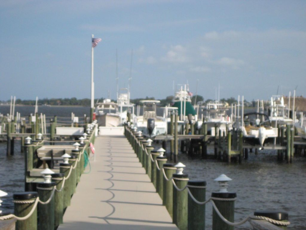 Photo of 1600 NE Dixie Hwy Highway #10-107, Jensen Beach, FL 34957 (MLS # R11108296)