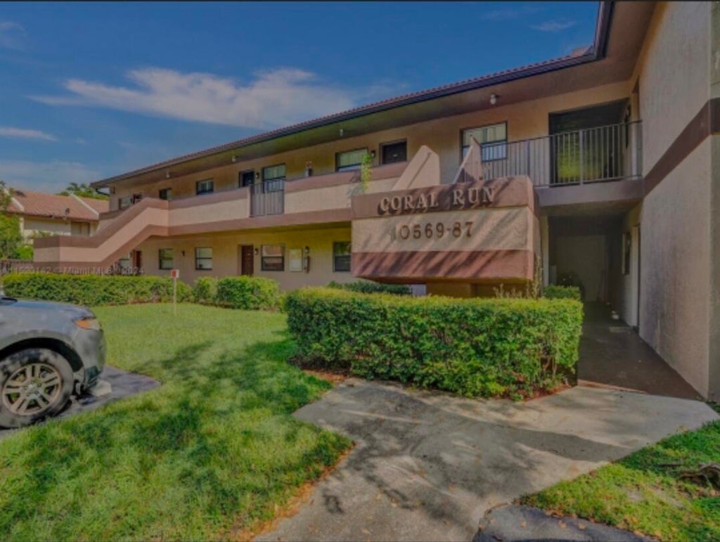 Photo of 10581 ROYAL PALM Boulevard #10581, Coral Springs, FL 33065 (MLS # B26088164)